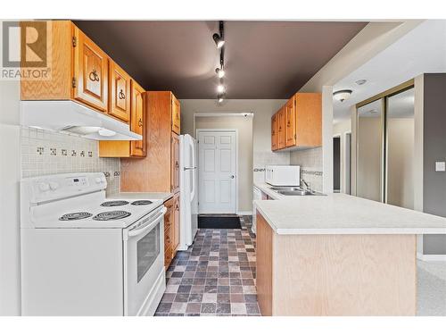 1801 32 Street Unit# 202, Vernon, BC - Indoor Photo Showing Kitchen With Double Sink