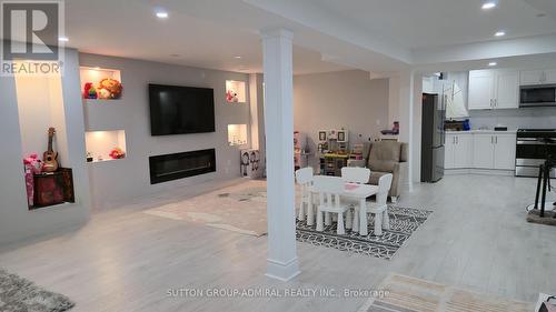 932 Schaeffer Outlook, Newmarket, ON - Indoor Photo Showing Other Room With Fireplace