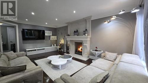 932 Schaeffer Outlook, Newmarket, ON - Indoor Photo Showing Living Room With Fireplace