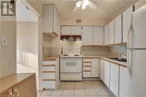 58 Bridgeport Road E Unit# 409, Waterloo, ON - Indoor Photo Showing Kitchen With Double Sink