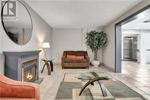 58 Bridgeport Road E Unit# 409, Waterloo, ON - Indoor With Fireplace