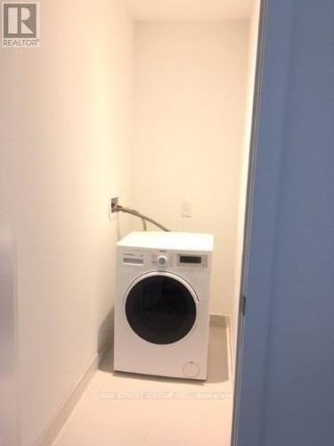 2105 - 77 Shuter Street, Toronto, ON - Indoor Photo Showing Laundry Room