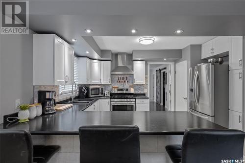 260 31St Street E, Prince Albert, SK - Indoor Photo Showing Kitchen With Double Sink