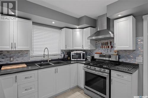 260 31St Street E, Prince Albert, SK - Indoor Photo Showing Kitchen With Double Sink