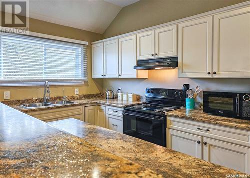 105 Main Street, Harris, SK - Indoor Photo Showing Kitchen With Double Sink