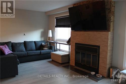 4E Maple Ridge Crescent, Ottawa, ON - Indoor Photo Showing Living Room With Fireplace