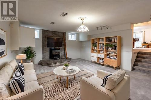 Virtually Staged - 71 Young Street, Dundalk, ON - Indoor Photo Showing Living Room With Fireplace