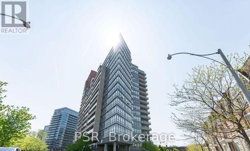 201 - 38 Joe Shuster Way, Toronto, ON - Outdoor With Facade