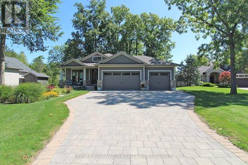 10138 Merrywood Drive, Lambton Shores (Grand Bend), ON - Outdoor With Facade