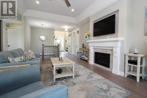 10138 Merrywood Drive, Lambton Shores (Grand Bend), ON - Indoor Photo Showing Living Room With Fireplace