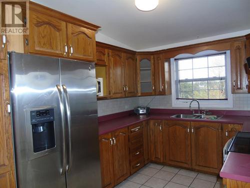 13 Dosco Hill, Bell Island, NL - Indoor Photo Showing Kitchen With Double Sink