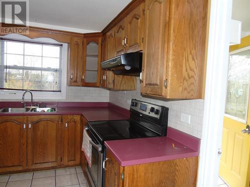 13 Dosco Hill, Bell Island, NL - Indoor Photo Showing Kitchen With Double Sink