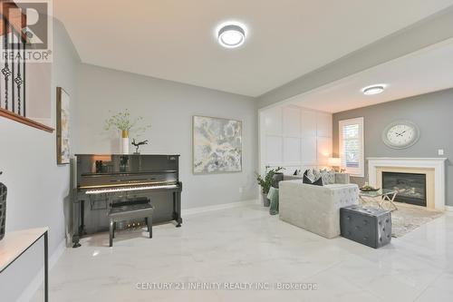 13 Snowy Owl Way, Toronto (Rouge), ON - Indoor With Fireplace