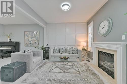 13 Snowy Owl Way, Toronto (Rouge), ON - Indoor Photo Showing Living Room With Fireplace