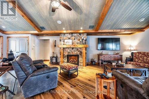 19 Ledge Road, Galway-Cavendish And Harvey, ON - Indoor Photo Showing Living Room With Fireplace