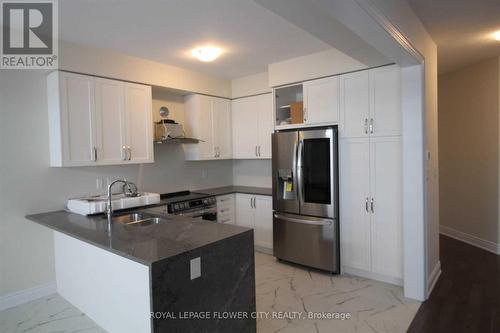 73 Sundin Drive, Haldimand, ON - Indoor Photo Showing Kitchen With Double Sink