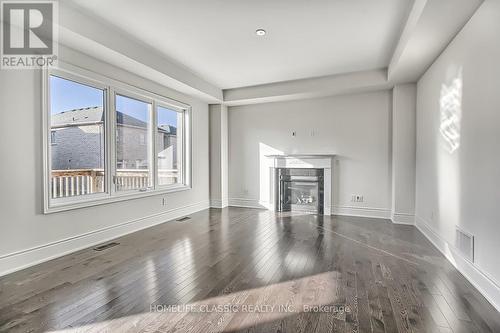 31 Robert Baldwin Boulevard, East Gwillimbury, ON - Indoor Photo Showing Living Room With Fireplace