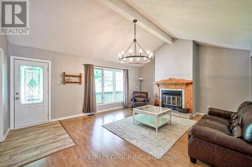 7 Agnes Street, Oro-Medonte, ON - Indoor Photo Showing Living Room With Fireplace