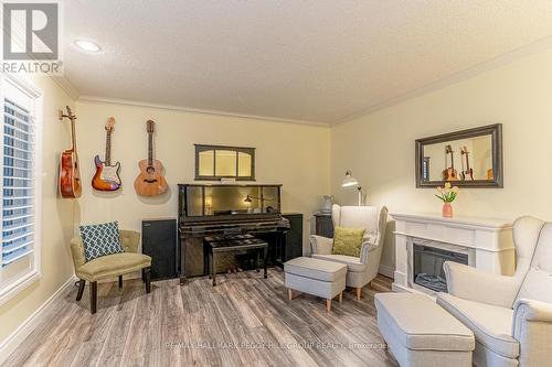 1166 Sunnidale Road, Springwater, ON - Indoor Photo Showing Living Room With Fireplace