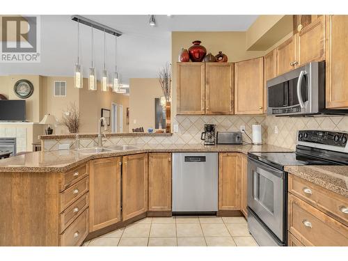 1128 Sunset Drive Unit# 407, Kelowna, BC - Indoor Photo Showing Kitchen With Double Sink