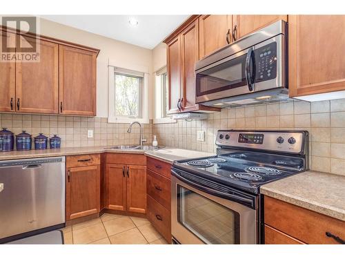 3350 Woodsdale Road Unit# 501, Lake Country, BC - Indoor Photo Showing Kitchen With Double Sink