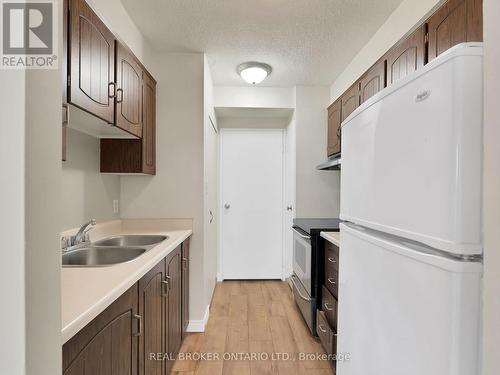 701 - 55 William Street E, Oshawa, ON - Indoor Photo Showing Kitchen With Double Sink