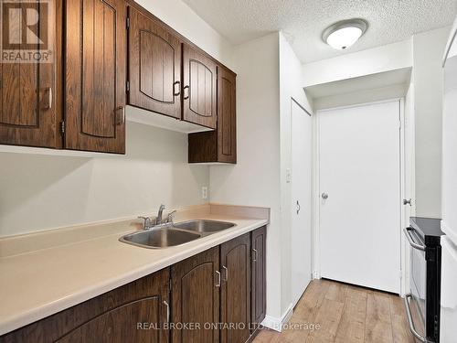 701 - 55 William Street E, Oshawa, ON - Indoor Photo Showing Kitchen With Double Sink