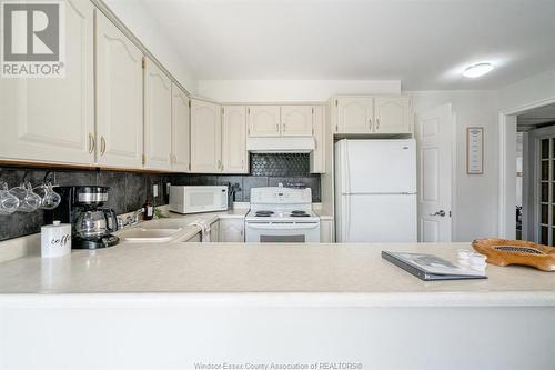 166 Stirling Street, Lakeshore, ON - Indoor Photo Showing Kitchen With Double Sink