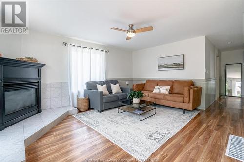 166 Stirling Street, Lakeshore, ON - Indoor Photo Showing Living Room With Fireplace