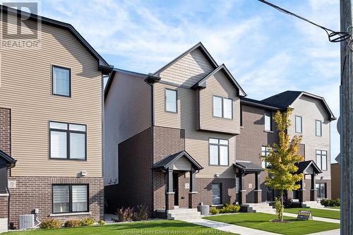 701 Brownstone Drive, Lakeshore, ON - Outdoor With Facade