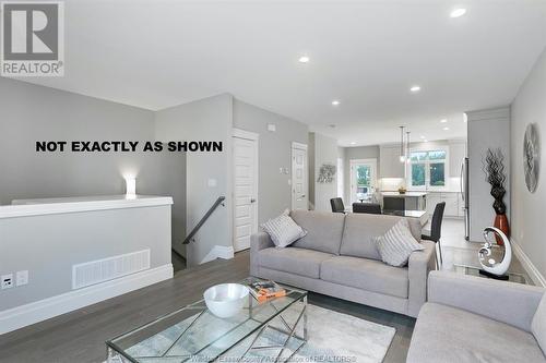 701 Brownstone Drive, Lakeshore, ON - Indoor Photo Showing Living Room