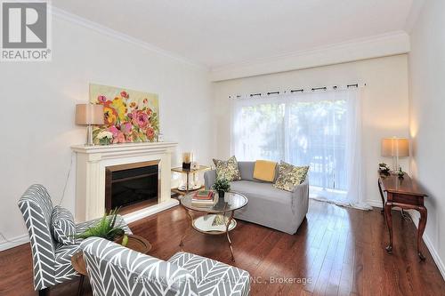 30 - 30 Ashglen Way, Markham, ON - Indoor Photo Showing Living Room With Fireplace