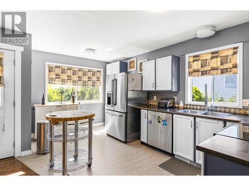 222 Biggar Road, Kelowna, BC - Indoor Photo Showing Kitchen With Double Sink