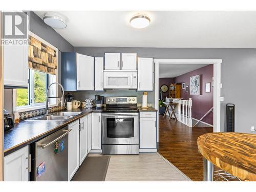 222 Biggar Road, Kelowna, BC - Indoor Photo Showing Kitchen With Double Sink