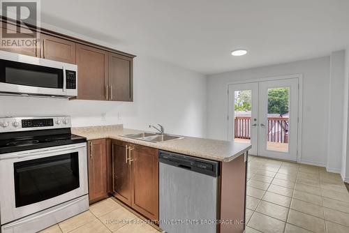 Upper - 35 Crew Court, Barrie, ON - Indoor Photo Showing Kitchen With Double Sink