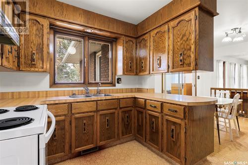 62 Green Meadow Road, Regina, SK - Indoor Photo Showing Kitchen With Double Sink