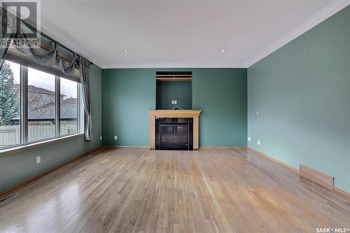 12118 Wascana Heights, Regina, SK - Indoor Photo Showing Living Room With Fireplace