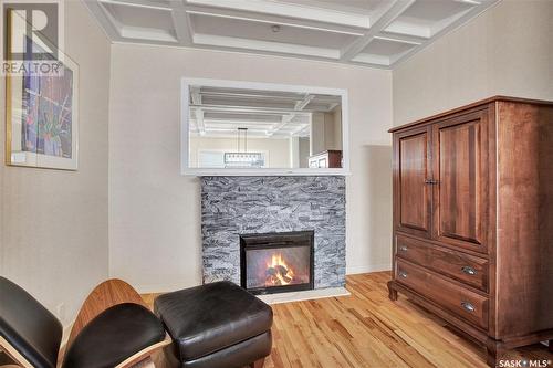 108 Saskatchewan Crescent W, Saskatoon, SK - Indoor Photo Showing Living Room With Fireplace