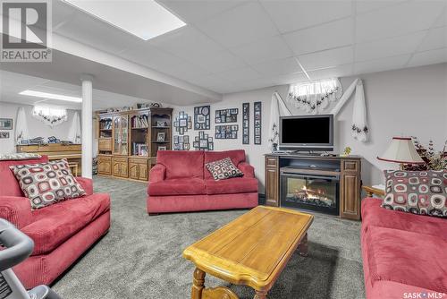 563 Costigan Road, Saskatoon, SK - Indoor Photo Showing Living Room With Fireplace