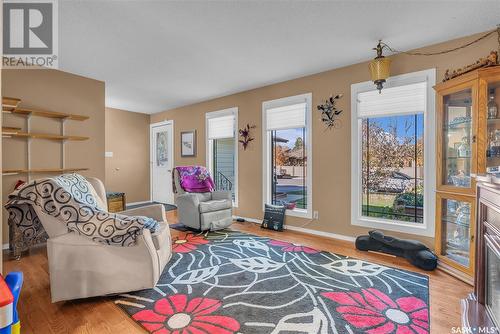 563 Costigan Road, Saskatoon, SK - Indoor Photo Showing Living Room With Fireplace