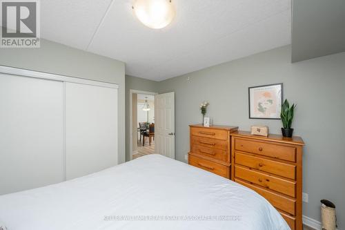 105 - 645 St David Street S, Centre Wellington, ON - Indoor Photo Showing Bedroom