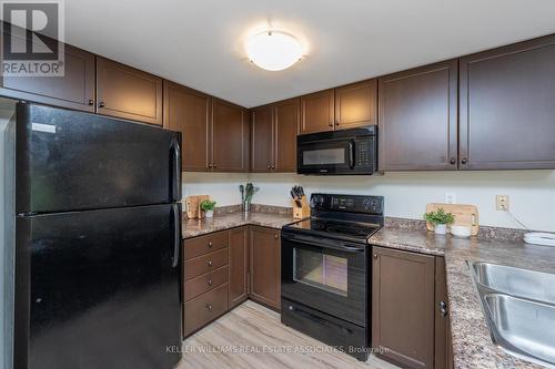 105 - 645 St David Street S, Centre Wellington, ON - Indoor Photo Showing Kitchen