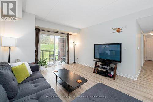 105 - 645 St David Street S, Centre Wellington, ON - Indoor Photo Showing Living Room