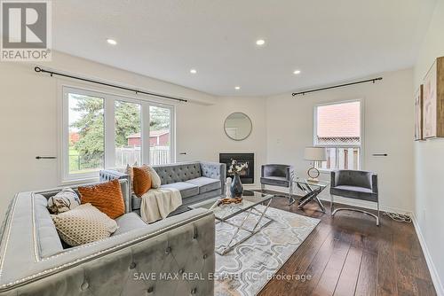 40 Eric Clarke Drive, Whitby, ON - Indoor Photo Showing Living Room With Fireplace