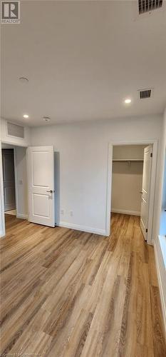 Spare room featuring light hardwood / wood-style floors - 525 New Dundee Road Unit# 602, Kitchener, ON - Indoor Photo Showing Other Room