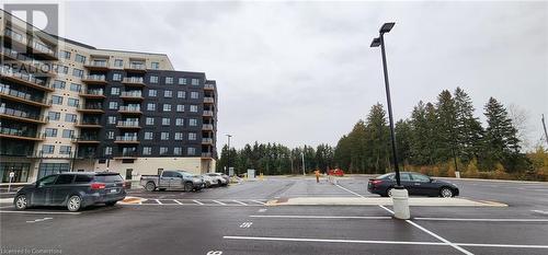 View of building exterior - 525 New Dundee Road Unit# 602, Kitchener, ON - Outdoor With Balcony With Facade