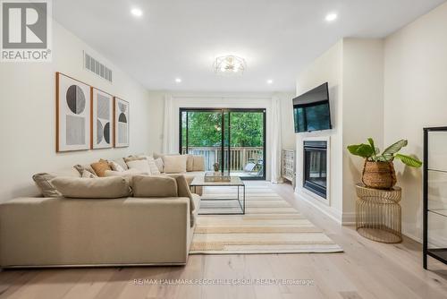 12 Centre Street, Innisfil, ON - Indoor Photo Showing Living Room With Fireplace