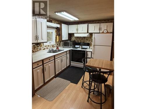 10885 Highplain Road, Prince George, BC - Indoor Photo Showing Kitchen With Double Sink