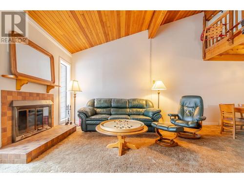 1191 Apex Mountain Road Unit# 40, Penticton, BC - Indoor Photo Showing Living Room With Fireplace