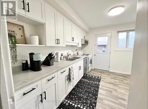 2 - 4 Westmount Drive, Belleville, ON - Indoor Photo Showing Kitchen With Double Sink